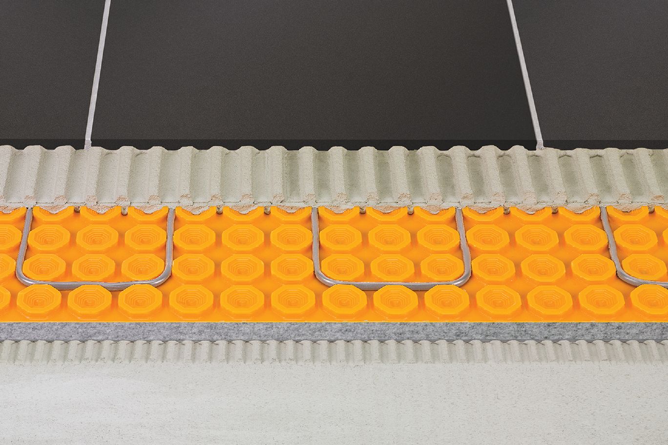 Plancher chauffant au sous-sol : un nouveau produit tout-en-un